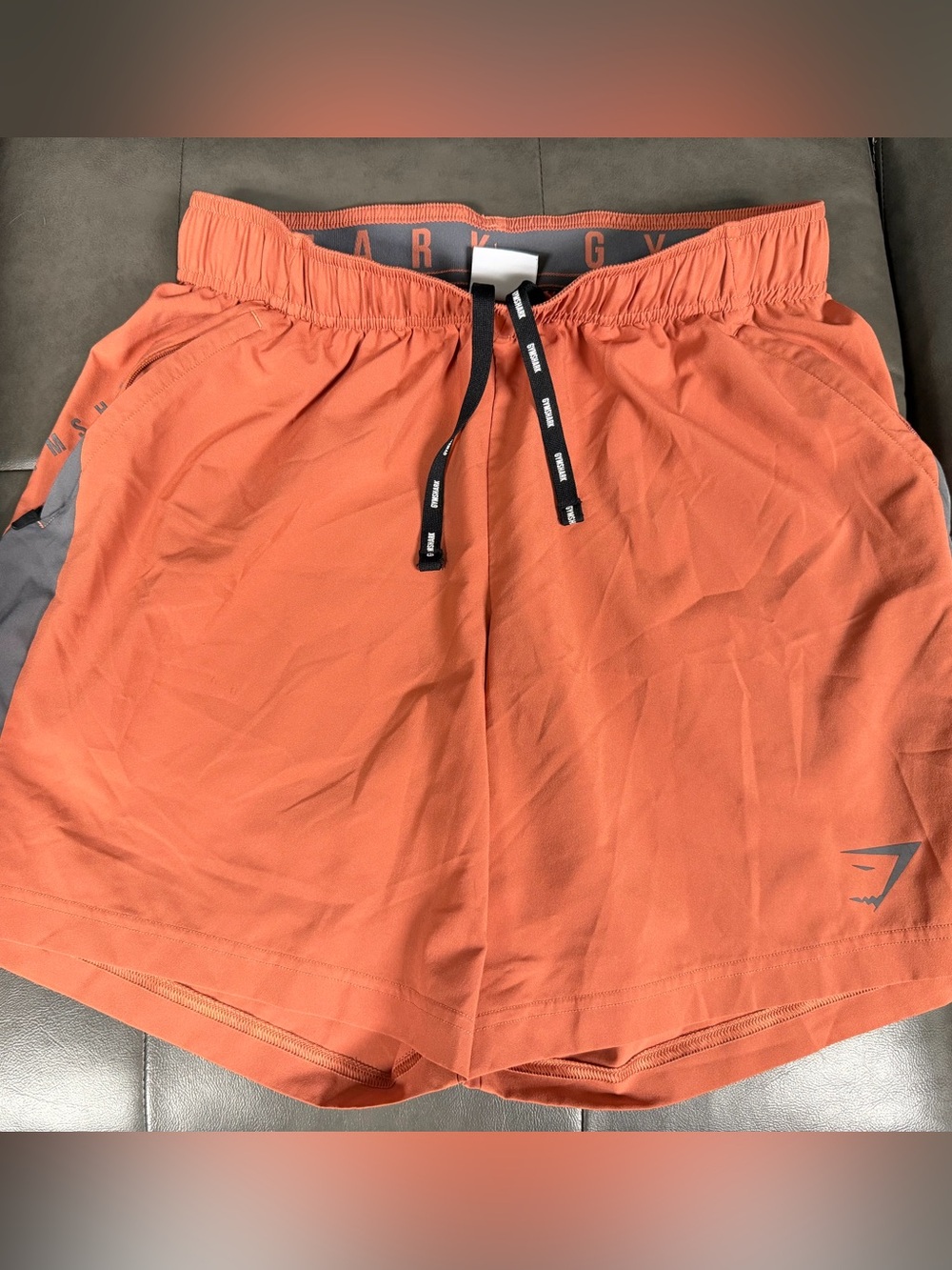 Gymshark Men’s Rust Orange Athletic Shorts with Black Drawstring